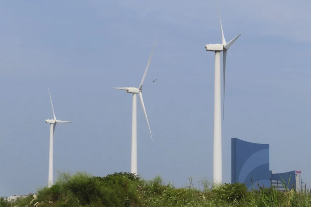 On July 20, land-based wind turbines in Atlantic City, New Jersey, rotate.